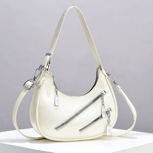 Fashionable off-white crescent moon bag with parallel zipper design and chain detail
