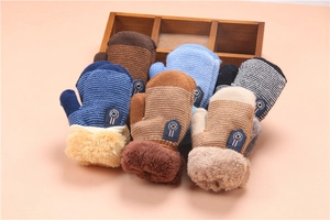 Detailed view of assorted knit mittens with thick plush cuffs in various colors