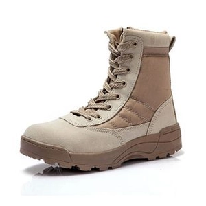 Detail of high-top tactical boots featuring sand suede and durable nylon canvas