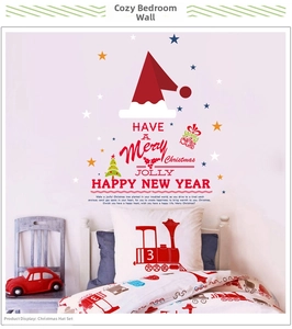 Detailed view of Christmas hat wall decals with stars on a cozy bedroom background