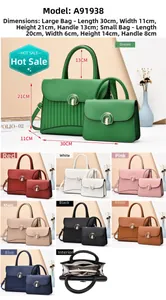 Close-up of textured PU leather two-piece handbag set with elegant round metal buckle