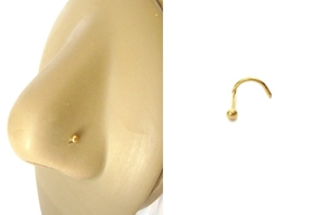 Detailed view of a gold ball nose stud with l-shaped post and realistic nose model view