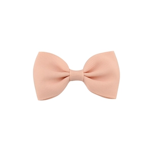 Classic light pink grosgrain ribbon bow hair clip for girls with a solid color texture