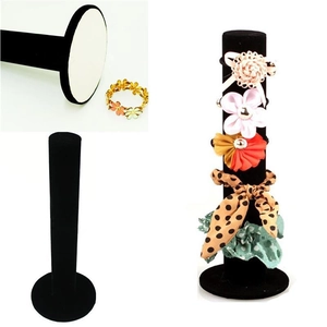 Vertical black velvet hair tie and bracelet display stand with round base for jewelry