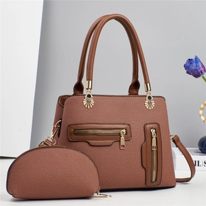 Brown textured women's tote bag and crossbody pouch set with golden hardware and leather handles