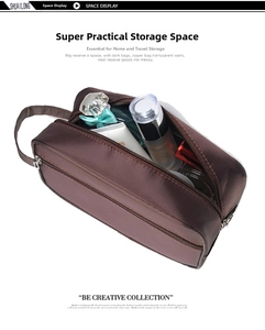 Close-up of brown waterproof travel toiletry bag showing large storage capacity