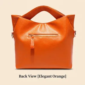 Bright orange lychee grain leather tote bag with back zipper pocket and twin handles