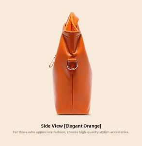 Side view of elegant orange pebbled leather handbag showing trapezoid structure and texture