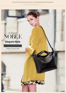 Close-up of black lychee grain leather handbag styled with a bright yellow coat