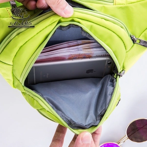 Fluorescent green waterproof oxford waist bag with multiple zippers and spacious interior