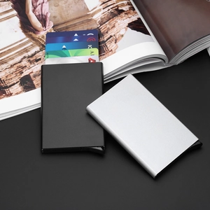 Detail of black and silver RFID blocking aluminum card holders with pop-up mechanism