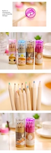 Detailed view of 12 mini colored pencils in a cartoon tube with a built-in sharpener lid