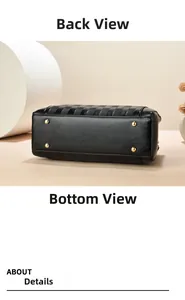 Detail view of black bucket bag bottom with four gold metal protective studs for wear resistance