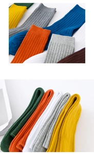Detail showing multi-color ribbed cotton socks set with premium texture and vertical stripes
