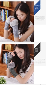 Close-up of cable knit fingerless gloves with soft faux fur trim in light and dark grey