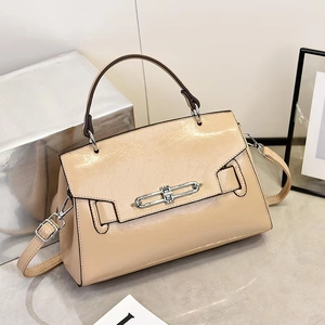 Elegant beige patent leather handbag for women with silver metal buckle and shoulder strap