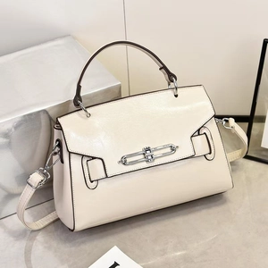 Cream white leather crossbody handbag with silver chain lock for modern women