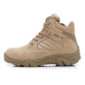 Detail of desert khaki tactical boots with side zipper and durable suede finish