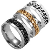 Macro shot of stainless steel rings with rotating chain inlay in various metallic finishes