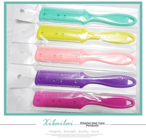 Manual hair thinning combs in five vibrant colors with built-in metal blades for fringe trimming