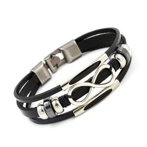 Close-up of multi-layer black leather woven bracelet with silver infinity symbol clasp