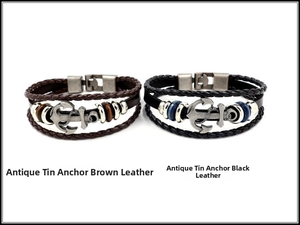 Detail view of multi-layer braided leather bracelets with antique pewter anchor charms