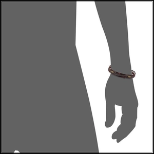 Detail of dark brown braided multilayer leather bracelet with gold metal clasp on wrist
