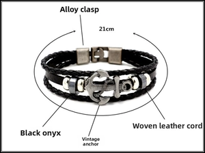 Detail view of 21cm nautical anchor bracelet with woven leather straps and hematite beads