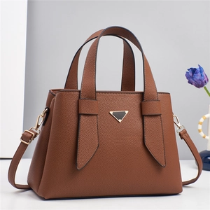 Elegant brown lychee pattern leather handbag with adjustable strap for women