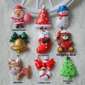 Nine-piece glittery resin Christmas charms including Santa, Reindeer, and Tree for DIY crafts