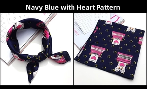 Detail of navy blue silk-feel square scarf with typewriter and heart print design