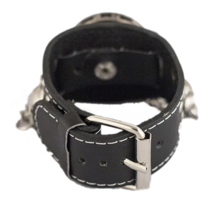 Punk skull bracelet watch with black leather strap and visible white stitching details