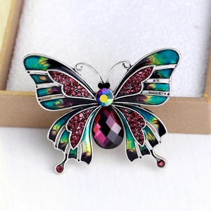 Exquisite butterfly brooch with colorful enamel wings and purple crystal drop pendant