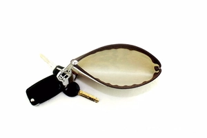 Internal view of the semi-circular coin purse showing space for keys and small essentials