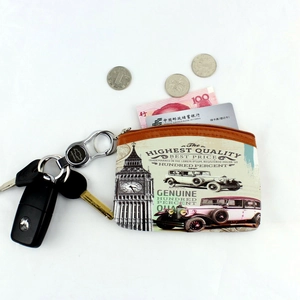 Vintage canvas coin purse with Eiffel Tower print, showing storage for cards and keys