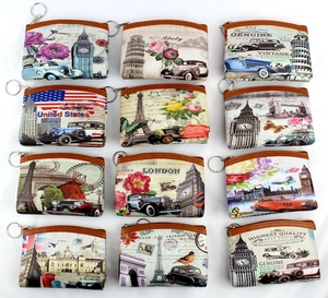 Flat lay of vintage Eiffel Tower and world landmarks print coin purses with keychains