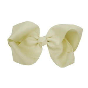 Detailed texture of 15cm oversized beige fabric bow hair clip for babies and kids