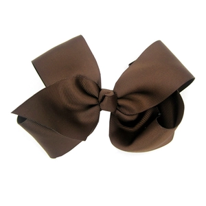 Detail of 15cm dark brown grosgrain ribbon hair bow with visible ribbed texture