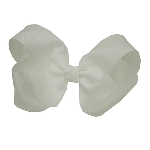 Macro detail of 15cm white grosgrain ribbon hair bow showing ribbed texture and structure