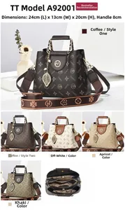 Detailed view of women's patterned satchel with dimensions 24x13x20cm and handle detail