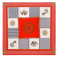 Flat lay of a 60x60cm square silk scarf with red, navy and white nautical patterns