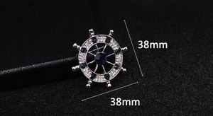 Close-up of anchor steering wheel brooch with blue crystals measuring 38mm x 38mm