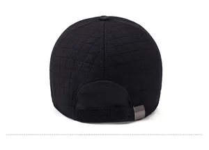 Detail view of winter baseball cap back featuring quilted texture and adjustable strap
