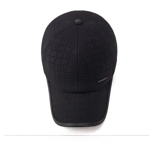 Top view of black winter baseball cap with diamond quilted texture and SPORT logo