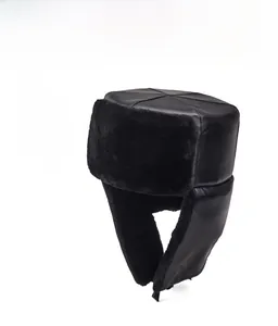 Detail of winter men's trapper hat with thick plush lining and windproof faux leather exterior