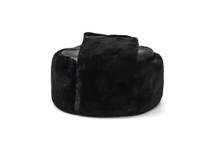 Detailed side view of a black winter trapper hat with premium faux fur and leather crown