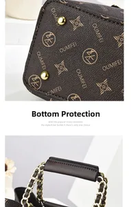 Close-up of brown crossbody bag featuring metal chain handle and protective gold feet