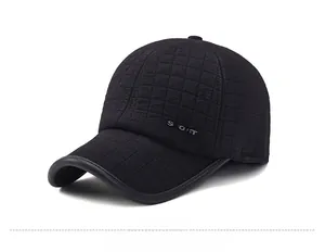 Detail of black winter baseball cap featuring quilted texture and SPORT embroidery side view