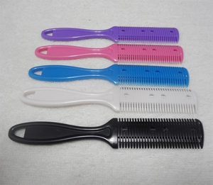 Close-up of dual-sided hair thinning combs in purple, pink, blue, white, and black