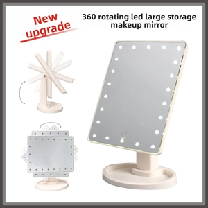 Detail view of the 360-degree rotating LED makeup mirror with a storage base in white
